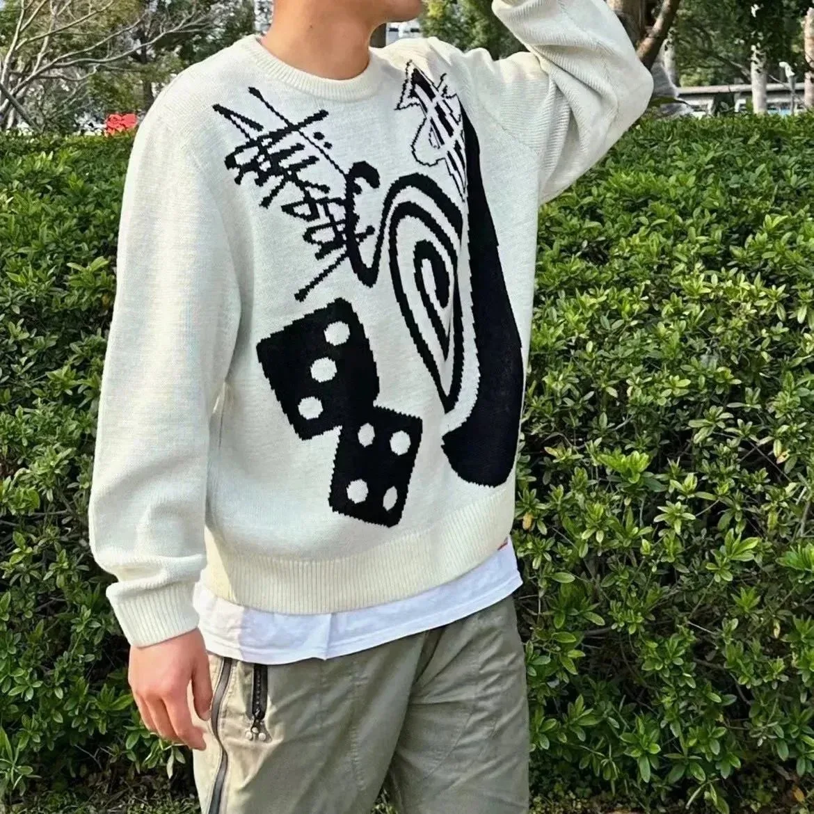 Unisex White Knit Sweater with Black Dice & Abstract Print